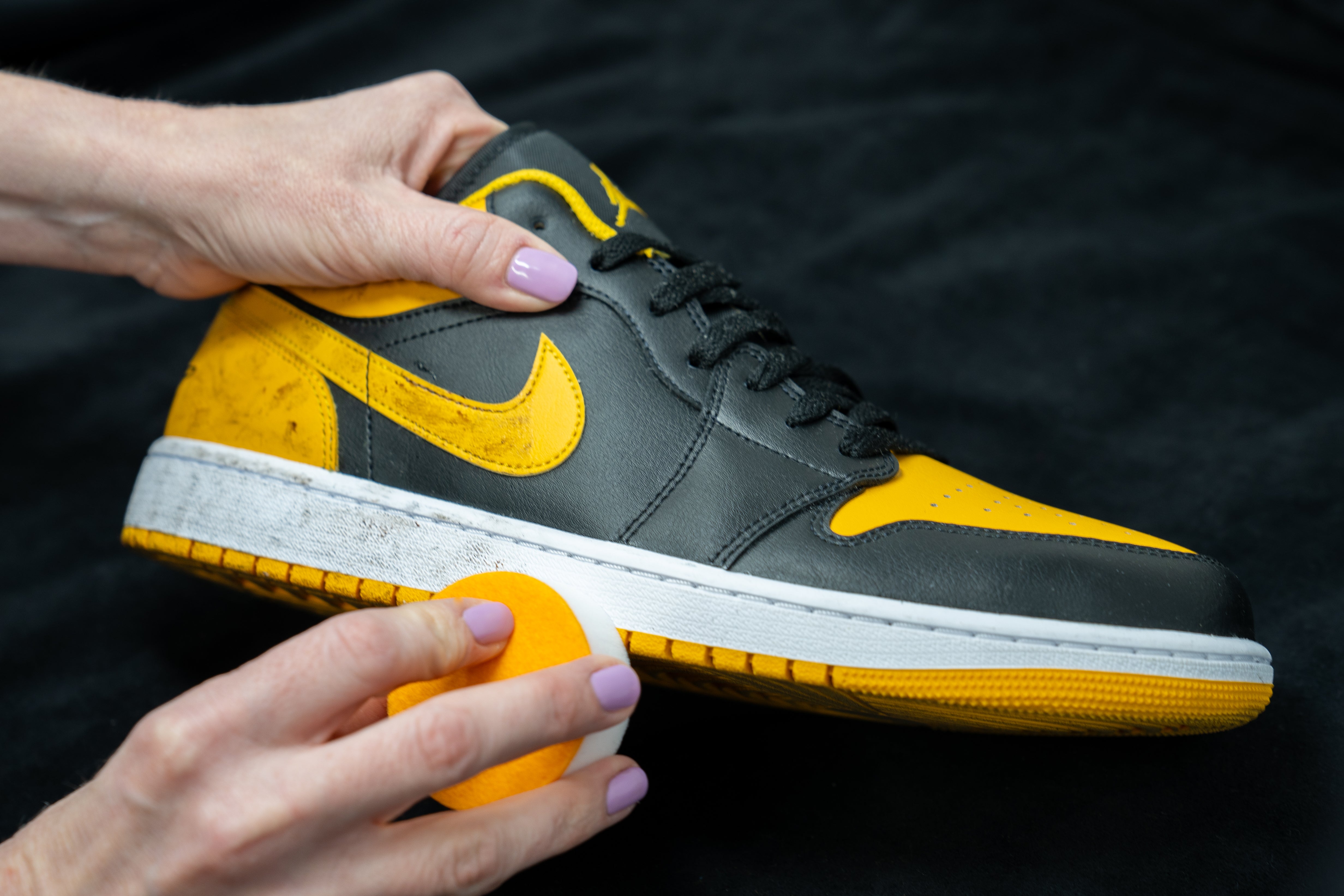 SneakERASERS sponge cleaning dirty basketball shoes