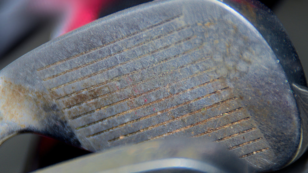 dirty golf club face